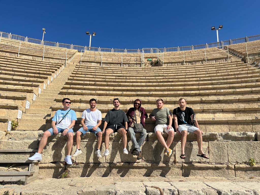 Friends together at an outdoor amphitheater